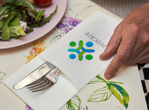 Customised napkin pocket with cutlery in care home